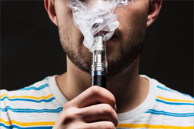 Young Man Vaping