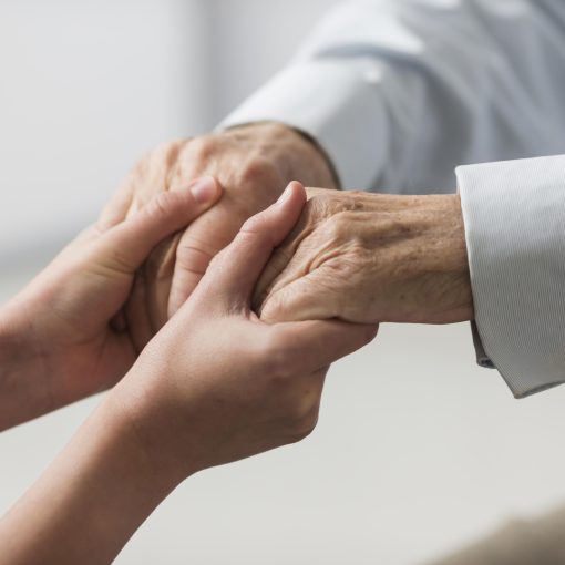 man holding hands with woman