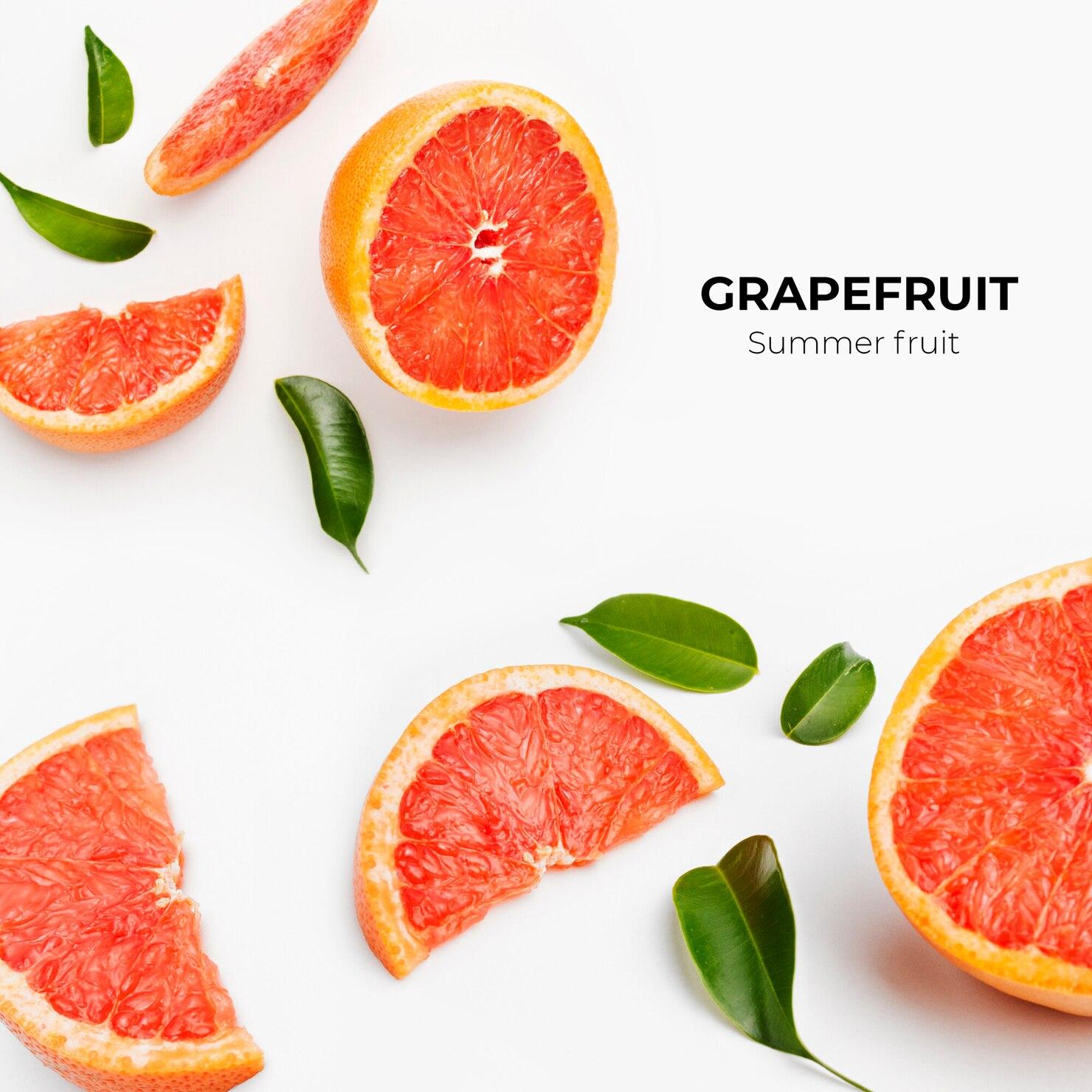 A group of grapefruits with leaves

Description automatically generated